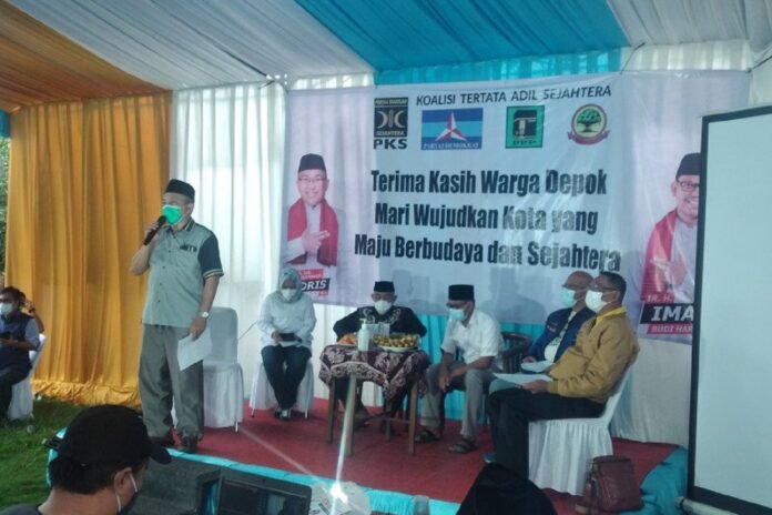 Ketua Tim Pemenangan Idris-Imam, Hafid Nasir ketika mengumumkan kemenangan Idris-Imam versi hitung cepat sebesar 55,38 persen. ANTARA | FERU LANTARA