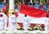 Tim Indonesia Tumbuh Bertugas pada Upacara Penurunan Bendera Negara