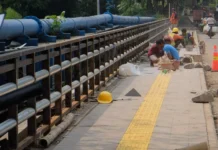 Rehabilitasi Jembatan GDC Depok Sudah Masuk Tahap Pemasangan Keramik