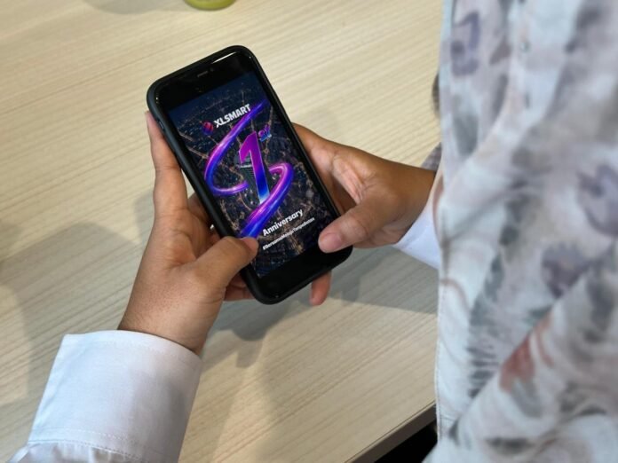 Perayaan anniversary perdana XLSMART Telecom Sejahtera Tbk diwarnai dengan berbagai promo menarik dari layanan XL, AXIS, dan Smartfren sebagai bentuk apresiasi kepada pelanggan. Foto: Harnas.id