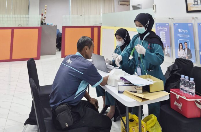 Pemeriksaan kesehatan berkala pekerja BRI Cabang Depok bersama Klinik Ismail Medika. Foto: Humas BRI