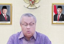Sebulan Tiga Kali Naik, BI Rate Kini 5,75 Persen, Rupiah Jadi Fokus Utama Gubernur Bank Indonesia Perry Warjiyo saat menyampaikan hasil RDG Juni 2026 melalui siaran daring (dok. YouTube Bank Indonesia)