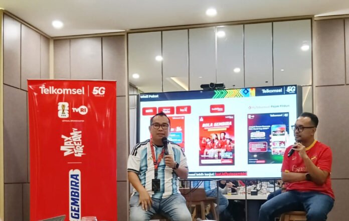 Suasana kegiatan nonton bareng Piala Dunia FIFA 2026™ yang digelar Telkomsel. (Dok. Telkomsel) Suasana kegiatan nonton bareng Piala Dunia FIFA 2026™ yang digelar Telkomsel. (Dok. Telkomsel)