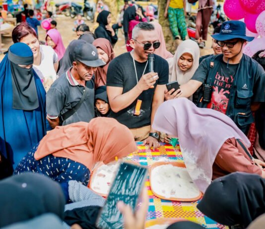 Bukan Sekadar Bantuan, Tim Bogor Peduli Bencana Ajak Warga Aceh Tamiang Rayakan Kemerdekaan Tim Bogor Peduli Bencana bersama warga dan anak-anak Desa Lintang Bawah, Aceh Tamiang, dalam kegiatan lomba menyambut HUT ke-81 Kemerdekaan RI. (Dok. Pemkot Bogor)