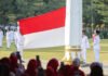 HUT ke-81 RI di Bogor, Paskibraka Sukses Jalankan Misi Penaikan Sang Merah Putih Paskibraka Kota Bogor menjalankan prosesi penaikan bendera Merah Putih pada upacara HUT ke-81 RI di Lapangan Sempur. Foto: Pemkot Bogor